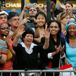New Yorkers wave and cheer at the Obamas' motorcade